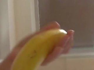 How-to: Young brunette lover teaches using a banana